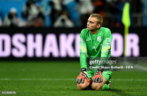 Jasper Cillessen of the Netherlands show his dejection after failing to stop the penalty by Maxi Rodriguez of Argentina in the penalty shootout in...