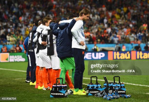 Tim Krul and players of the Netherlands watch the penalty shootout during the 2014 FIFA World Cup Brazil Semi Final match between Netherlands and...