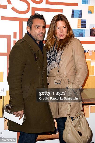 Jean-Pierre Martins and Alexandra Genoves attend the "Casse Tete Chinois" Premiere at Cinema UGC Normandie on November 25, 2013 in Paris, France.