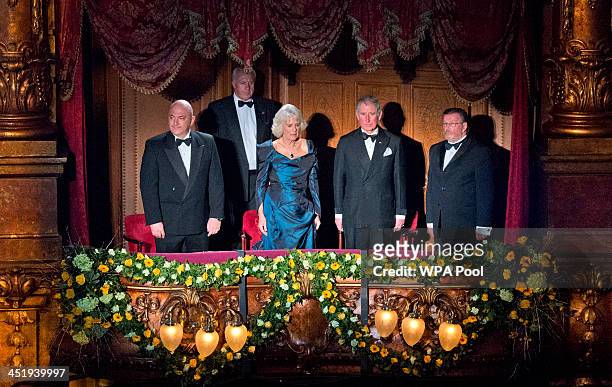 Prince Charles, Prince of Wales and Camilla, Duchess of Cornwall stand for the national anthem at the Royal Variety Performance at London Palladium...