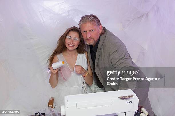 Frank Kessler and a model attend the Guido Maria Kretschmer after show party during the Mercedes-Benz Fashion Week Spring/Summer 2015 at on July 9,...