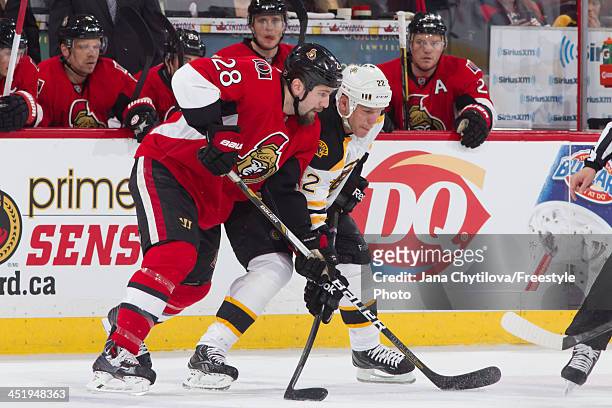 Matt Kassian of the Ottawa Senators prepares for a faceoff against Shawn Thornton of the Boston Bruins during an NHL game at Canadian Tire Centre on...