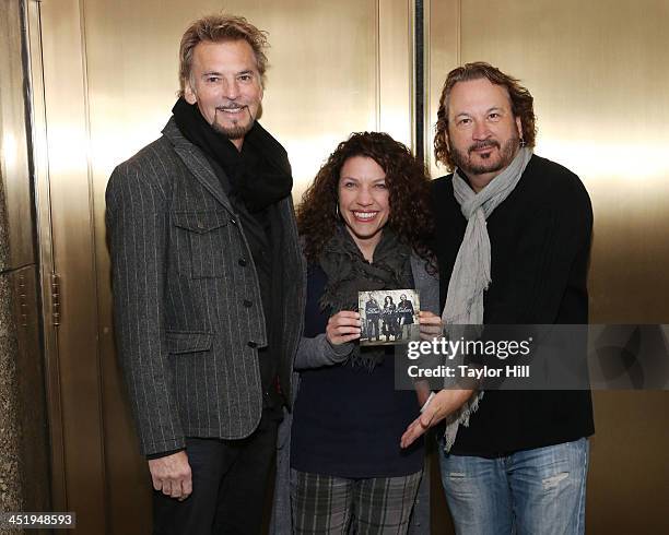 Musicians Kenny Loggins, Georgia Middleman and Gary Burr of Blue Sky Riders pose with their debut album "Finally Home" for a private photo shoot in...