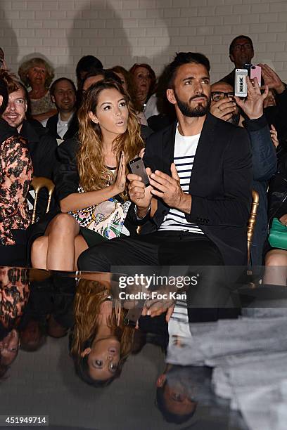 Nabilla Benattia and Thomas Vergara attend the Jean Paul Gaultier show as part of Paris Fashion Week - Haute Couture Fall/Winter 2014-2015 at 325 Rue...