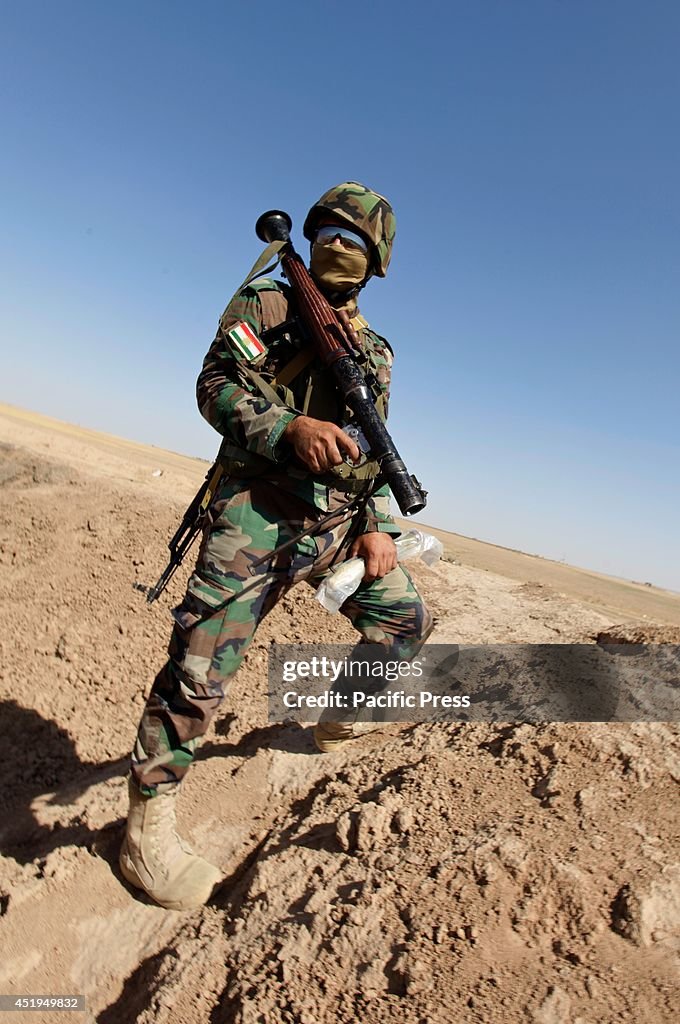 A soldier holding an RPG from the Kurdish Peshmerga 10th Brigade ...