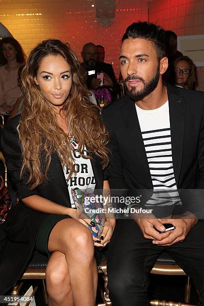 Nabilla Benattia and Thomas Vergara attend the Jean Paul Gaultier show as part of Paris Fashion Week - Haute Couture Fall/Winter 2014-2015 at 325 Rue...