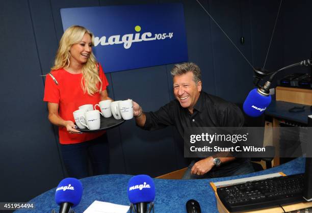 Denise Van Outen visits Neil Fox on Magic.FM at Magic FM Studio on July 10, 2014 in London, England.