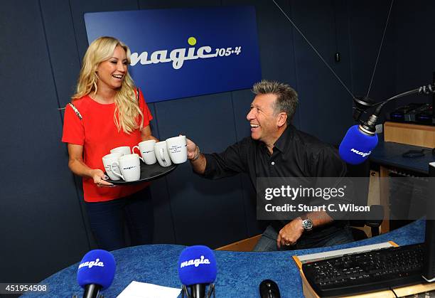 Denise Van Outen visits Neil Fox on Magic.FM at Magic FM Studio on July 10, 2014 in London, England.
