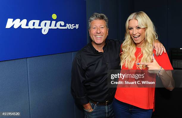 Denise Van Outen visits Neil Fox on Magic.FM at Magic FM Studio on July 10, 2014 in London, England.
