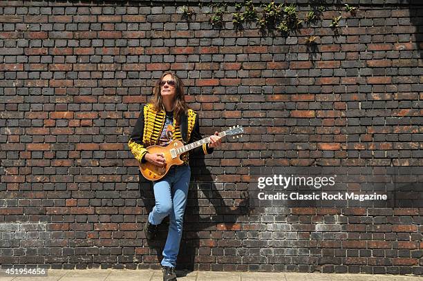 Portrait of American rock musician Larry Miller, photographed around Marylebone in London on July 5, 2013. Miller is best known as a guitarist and...