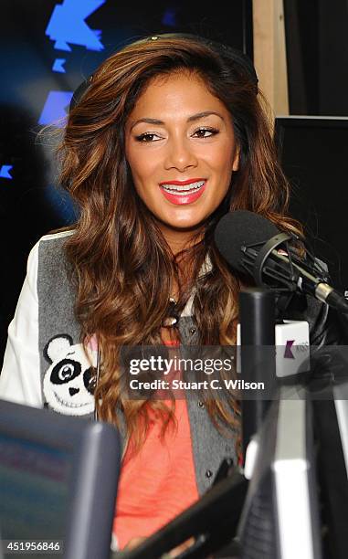 Nicole Scherzinger visits Kiss.FM at Kiss FM Studio's on July 10, 2014 in London, England.