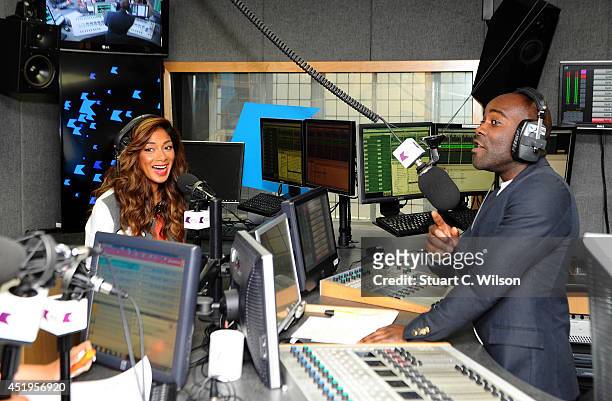 Nicole Scherzinger talks with Melvin O'Doom as she visits Kiss.FM at Kiss FM Studio's on July 10, 2014 in London, England.
