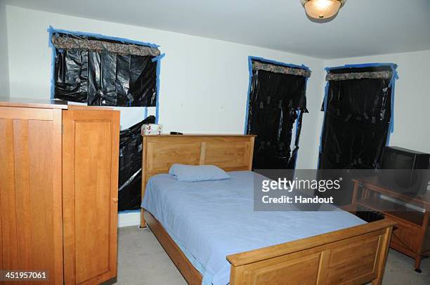In this handout crime scene evidence photo provided by the Connecticut State Police, shows the south east bedroom at the suspect's house on Yogananda...