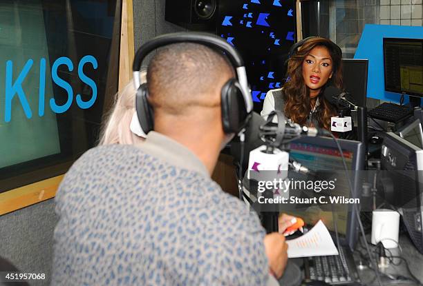 Nicole Scherzinger talks with Ricky Haywood Williams as she visits Kiss.FM at Kiss FM Studio's on July 10, 2014 in London, England.