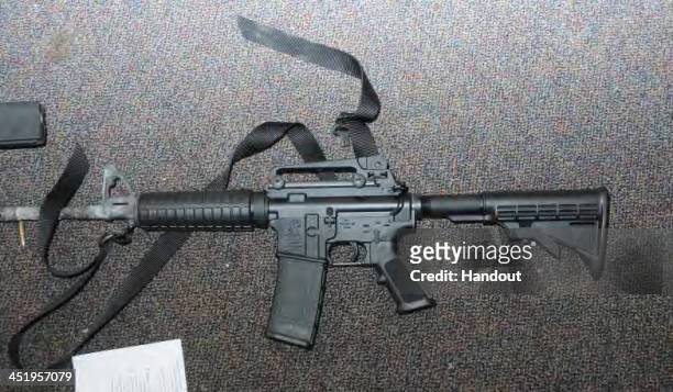 In this handout crime scene evidence photo provided by the Connecticut State Police, shows a Bushmaster rifle in Room 10 at Sandy Hook Elementary...