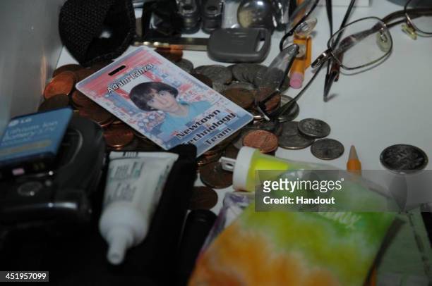 In this handout crime scene evidence photo provided by the Connecticut State Police, shows the Newtown Tehcnology Team ID of Adam Lanza in the...