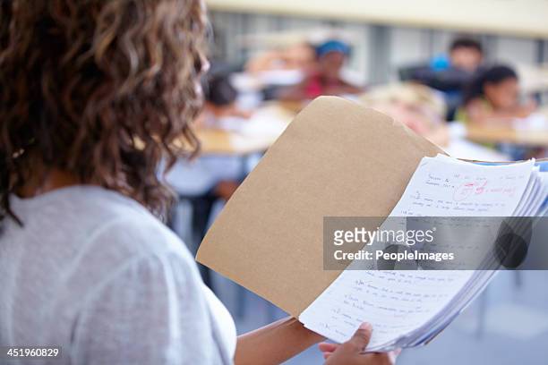 ready to announce the marks - exam papers stock pictures, royalty-free photos & images