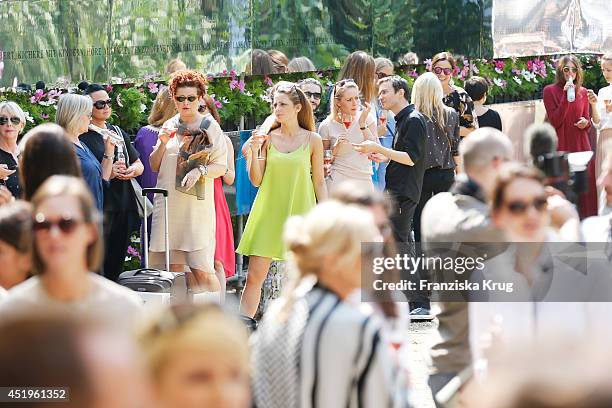 Guests attend the Schumacher show during the Mercedes-Benz Fashion Week Spring/Summer 2015 at Sankt Elisabeth Kirche on July 10, 2014 in Berlin,...