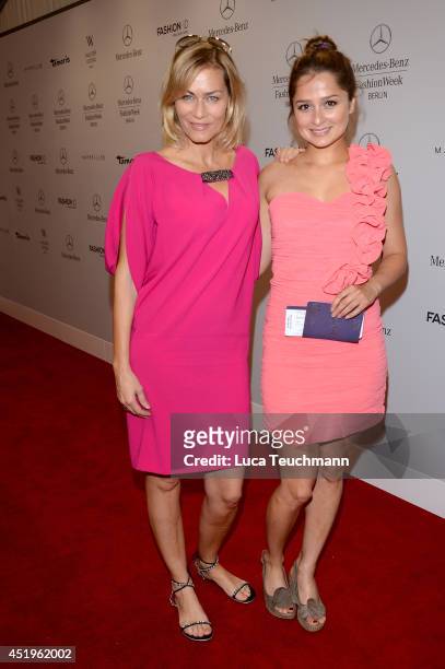 Gesine Cukrowski and Sarah Alles attend the Laurel show during the Mercedes-Benz Fashion Week Spring/Summer 2015 at Erika Hess Eisstadion on July 10,...