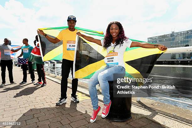 Shelly-Ann Fraser-Pryce and Yohan Blake of Jamacia during a photocall ahead of the Sainsbury's Glasgow Grand Prix on July 10, 2014 in Glasgow,...