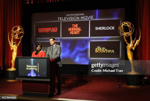 Mindy Kaling and Carson Daly announce the nominees at the 66th Primetime Emmy Awards nominations press conference held at Leonard H. Goldenson...
