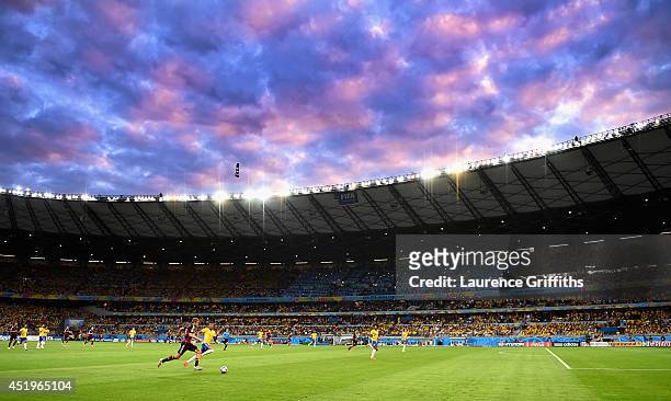 Luiz Gustavo of Brazil and Thomas Mueller of Germany during the 2014 FIFA World Cup Brazil Semi Final match between Brazil and Germanyat Estadio...