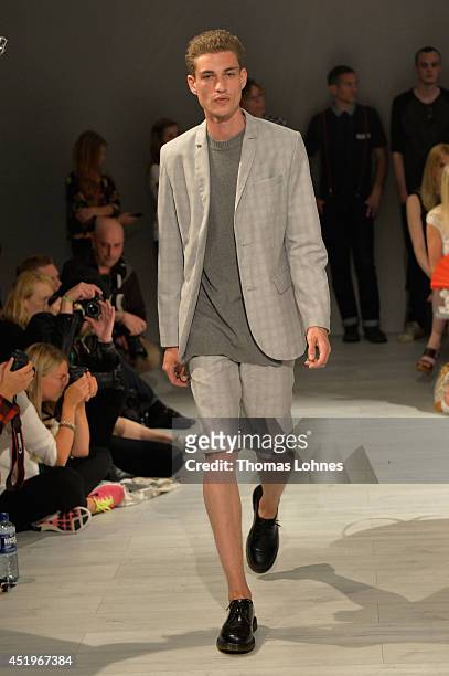 Model poses at the Sopopular show during the Mercedes-Benz Fashion Week Spring/Summer 2015 at Erika Hess Eisstadion on July 10, 2014 in Berlin,...