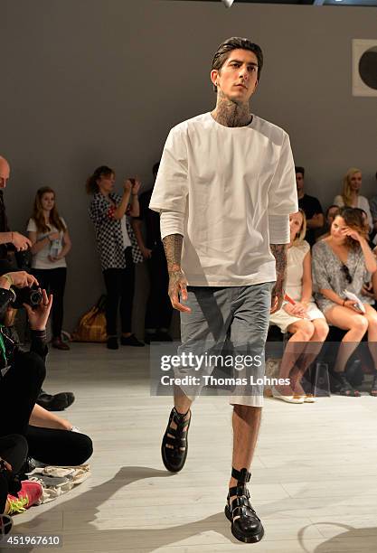 Model poses at the Sopopular show during the Mercedes-Benz Fashion Week Spring/Summer 2015 at Erika Hess Eisstadion on July 10, 2014 in Berlin,...