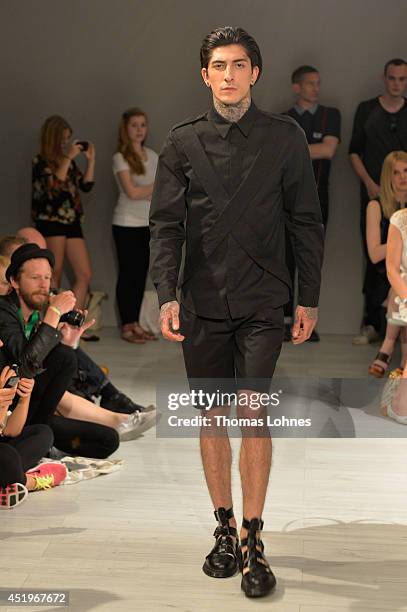 Model poses at the Sopopular show during the Mercedes-Benz Fashion Week Spring/Summer 2015 at Erika Hess Eisstadion on July 10, 2014 in Berlin,...