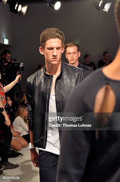 Model poses at the Sopopular show during the Mercedes-Benz Fashion Week Spring/Summer 2015 at Erika Hess Eisstadion on July 10, 2014 in Berlin,...