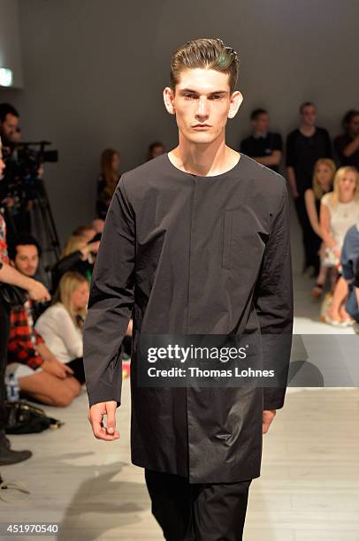 Model poses at the Sopopular show during the Mercedes-Benz Fashion Week Spring/Summer 2015 at Erika Hess Eisstadion on July 10, 2014 in Berlin,...