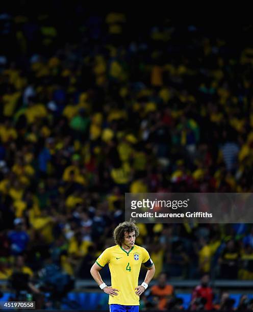 David Luiz of Brazil shows his disappointment after Germany's sixth goal during the 2014 FIFA World Cup Brazil Semi Final match between Brazil and...