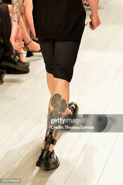 Model poses at the Sopopular show during the Mercedes-Benz Fashion Week Spring/Summer 2015 at Erika Hess Eisstadion on July 10, 2014 in Berlin,...