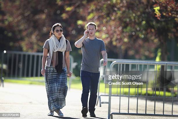 Mark Zuckerberg, chief executive officer and founder of Facebook Inc., and his wife Priscilla Chan attend the Allen & Company Sun Valley Conference...