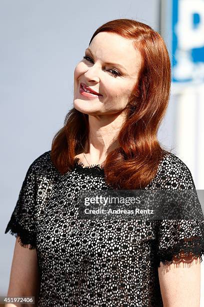 Actress Marcia Cross attends the Marc Cain show during the Mercedes-Benz Fashion Week Spring/Summer 2015 at Erika Hess Eisstadion on July 10, 2014 in...