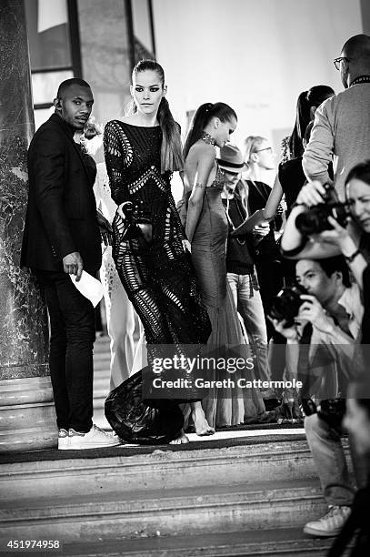 Models rush to change looks backstage during the Zuhair Murad show as part of Paris Fashion Week - Haute Couture Fall/Winter 2014-2015 at Palais Des...