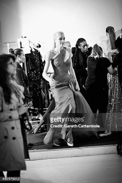 Models rush to change looks backstage during the Zuhair Murad show as part of Paris Fashion Week - Haute Couture Fall/Winter 2014-2015 at Palais Des...