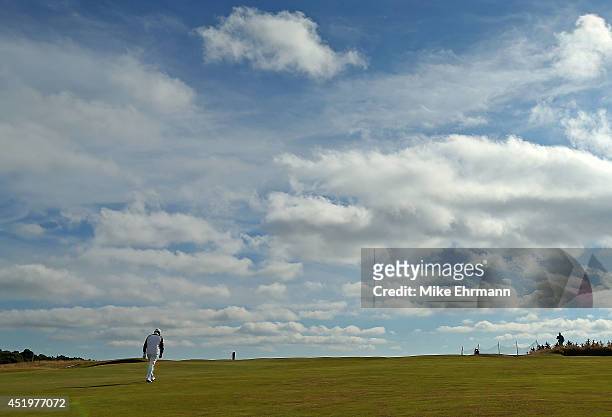Paul Lawrie of Scotland walks up the 18th hole during the first round of the 2014 Aberdeen Asset Management Scottish Open at Royal Aberdeen Golf Club...