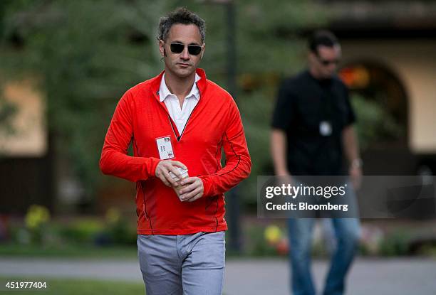 Alexander Karp, chief executive officer and co-founder of Palantir Technologies Inc., arrives to a morning session during the Allen & Co. Media and...