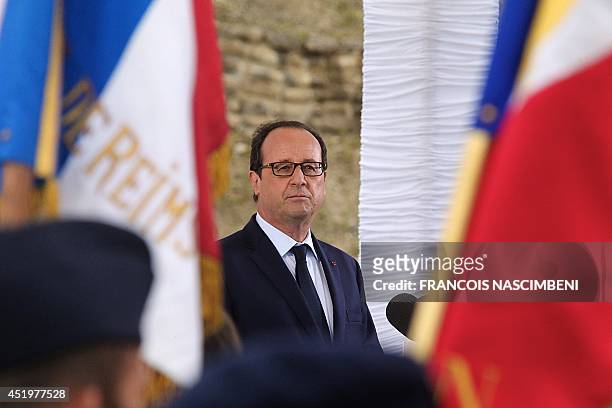 French President François Hollande delivers a speech during his visit to the fort of la Pompelle, outside Reims, northeastern France, on July 10,...