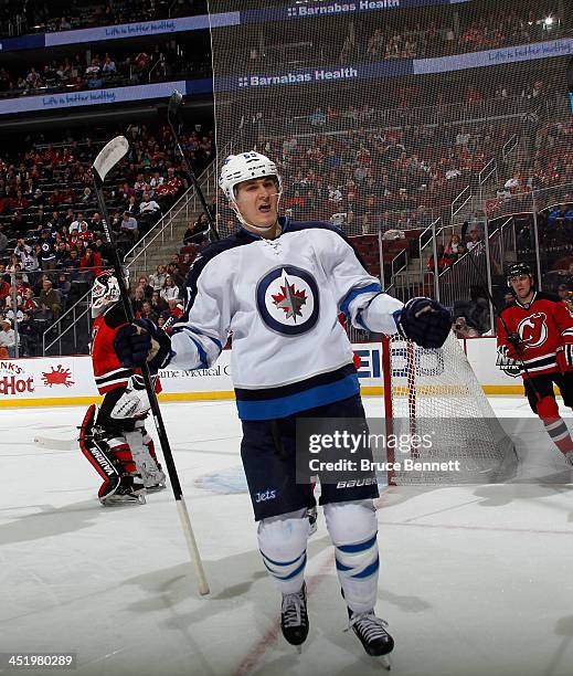 Mark Scheifele of the Winnipeg Jets celebrates his goal at 16:01 of the first period against the New Jersey Devils at the Prudential Center on...