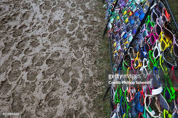 Sunglasses shop stands next to a dirty footpath at Openair Frauenfeld on July 10, 2014 in Frauenfeld, Switzerland.
