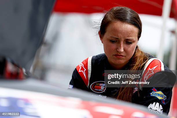 Kenzie Ruston, driver of the Ben Kennedy Racing Chevrolet stands in the garage area during practice for the Granite State 100 in the K&N Pro Series...