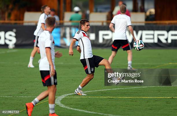 Philipp Lahm of Germany controls the ball during the German national team training session at Campo Bahia on July 10, 2014 in Santo Andre, Brazil.