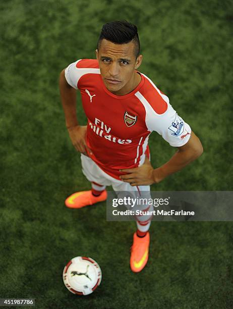 Arsenal unveil new signing Alexis Sanchez at The Arsenal training ground, St Albans on July 10, 2014 in London, England.