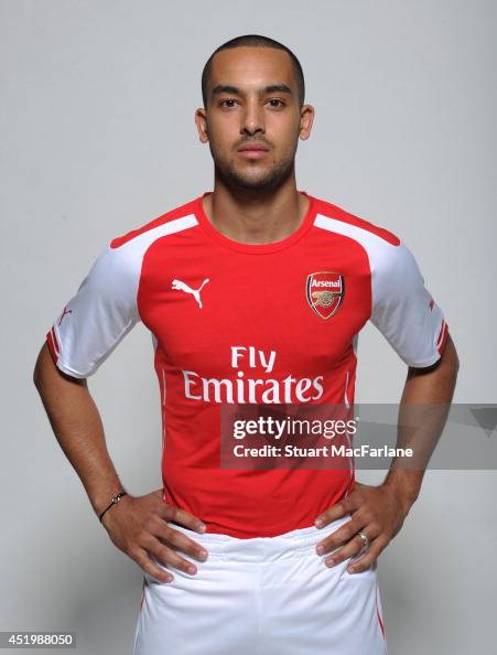 Theo Walcott wears the new Puma Arsenal kit for season 2013/14 at