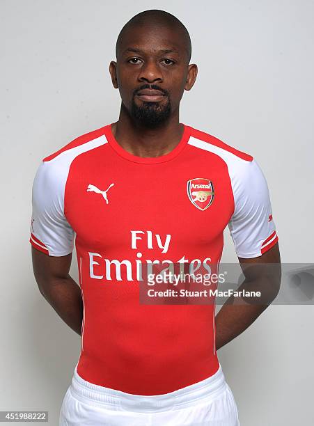 Abou Diaby wears the new Puma Arsenal kit for season 2013/14 at London Colney on April 23, 2014 in St Albans, England.