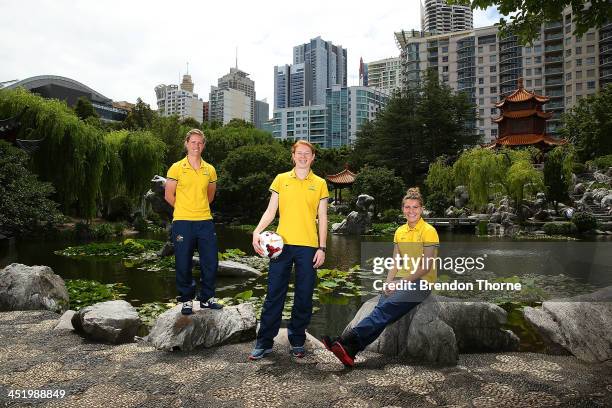 Elise Kellond-Knight, Clare Polkinghorne and Stephanie Catley of the Matildas pose during an Australian Matildas media session at the Chinese Garden...