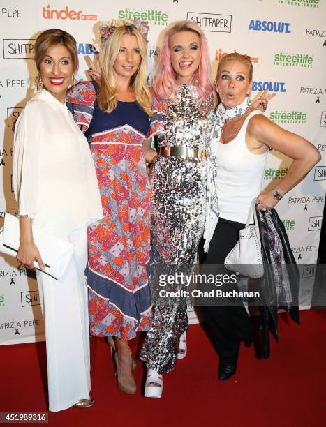 Senna Gammour, Giulia Siegel, Bonnie Strange and Claudia Effenberg attend the Shitpaper launch party on July 10, 2014 in Berlin, Germany.