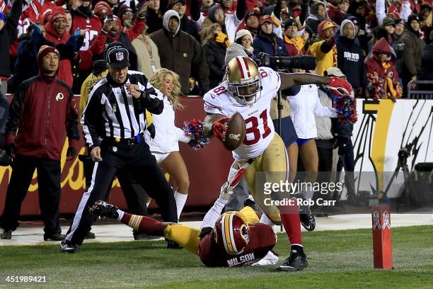 Wide receiver Anquan Boldin of the San Francisco 49ers catches a 19-yard touchdown against cornerback Josh Wilson of the Washington Redskins in the...